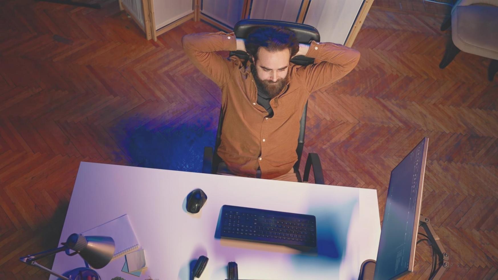 Students working on mobile game algorithm implementation during hands-on workshop session